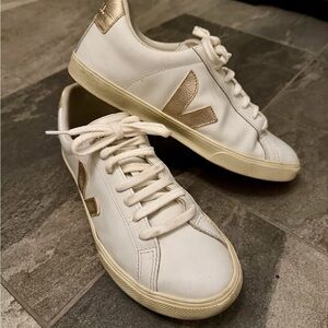 Veja Women's White and Gold Sneakers